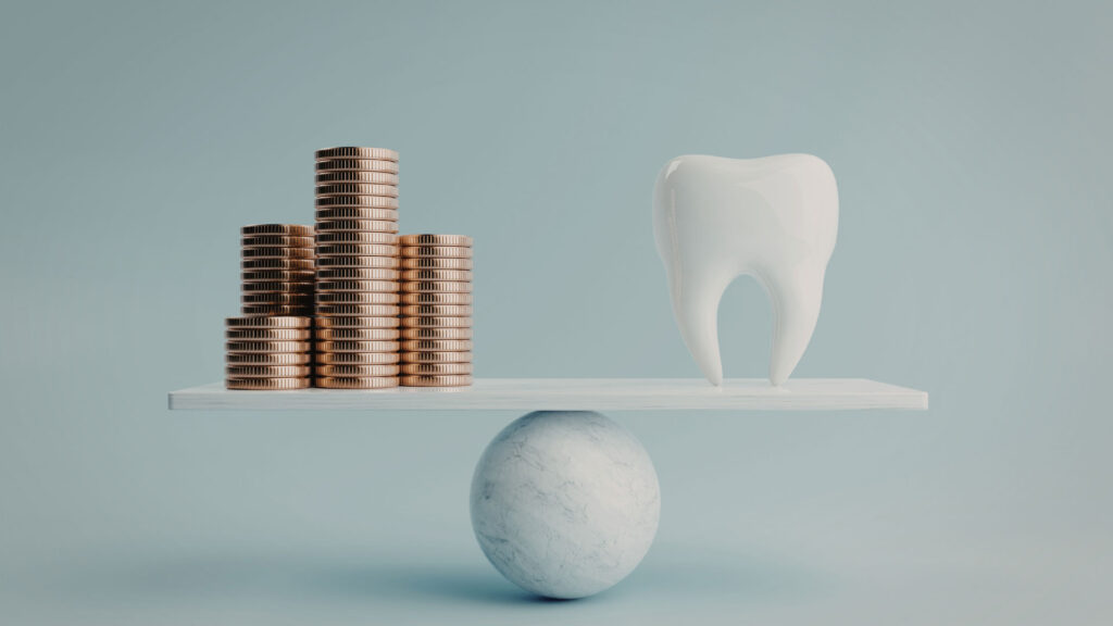 A 3D illustration of a white tooth balanced perfectly against stacks of gold coins on a marble scale, symbolizing the value and cost-effectiveness of MINISH veneers.